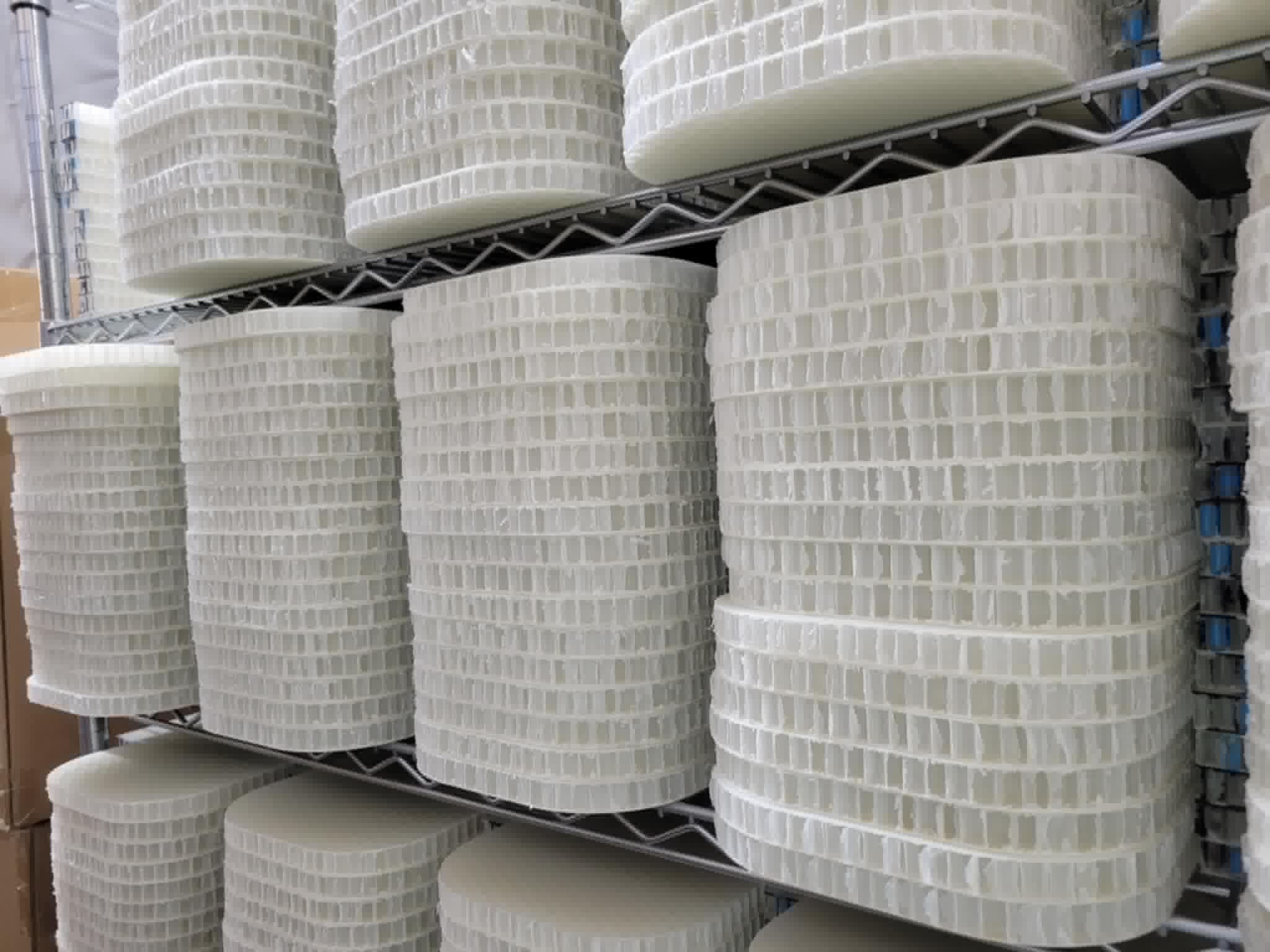 Stacks of pickleball paddle cores wait to be used in pickleball paddle designs. 