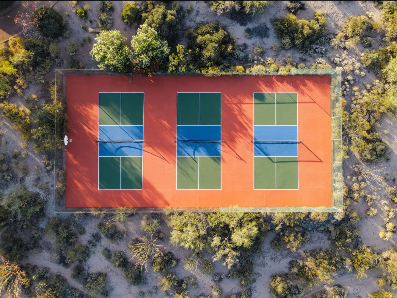 Whether you want to join an existing pickleball league or build your own backyard pickleball court, understanding pickleball court dimensions and layout will help you improve your pickleball game.